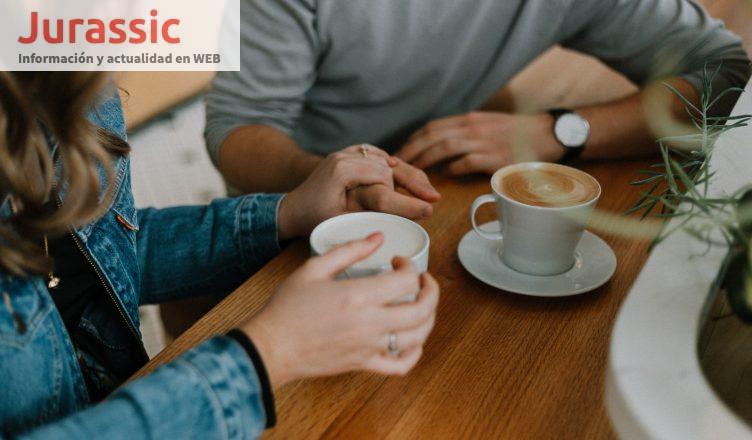 two mugs with coffee on table