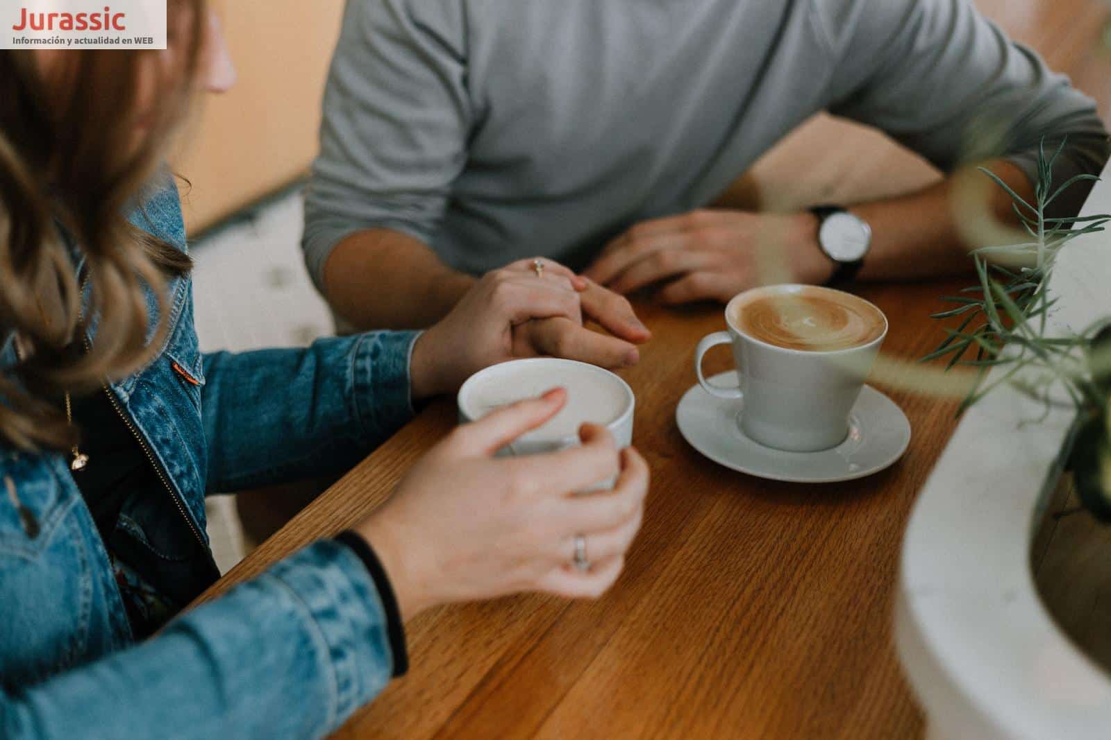 two mugs with coffee on table